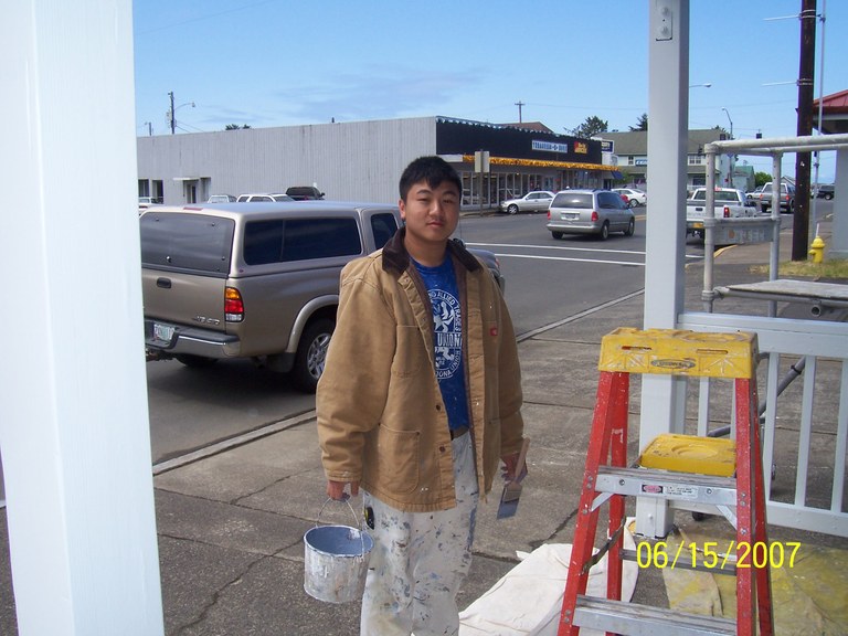 Job Corps. Student putting finishing touches on building!