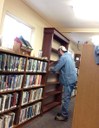 Darrel puts finishing touches on shelves